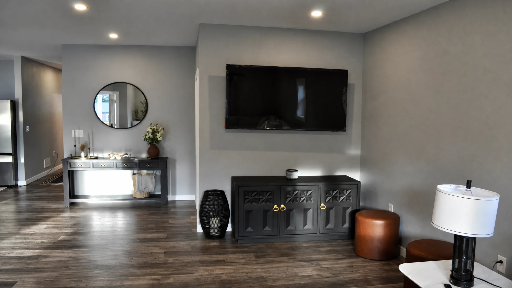Living area with smart TV and cozy seating