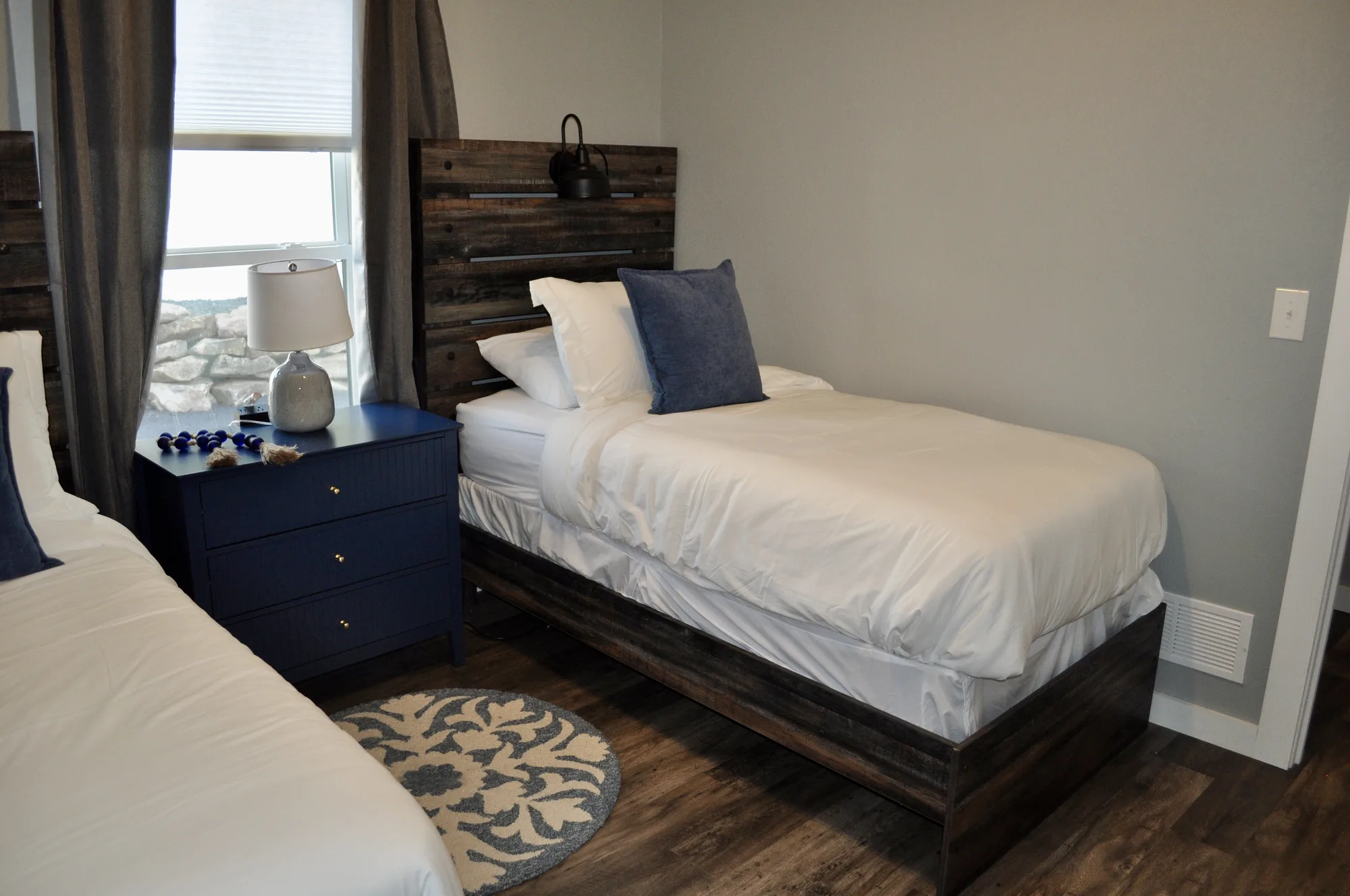 Second bedroom with two twin beds and valley view